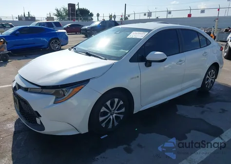 2021 Toyota Corolla Hybrid Le from USA, damaged, VIN JTDEAMDE8MJ020173